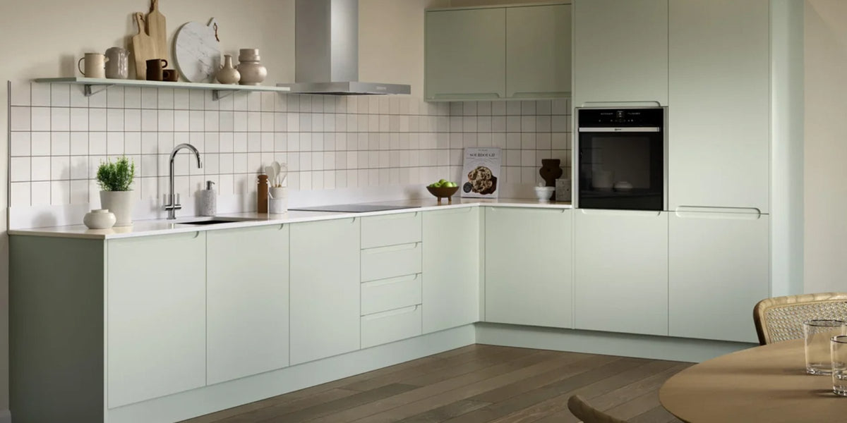 Kitchen with sage green handleless doors