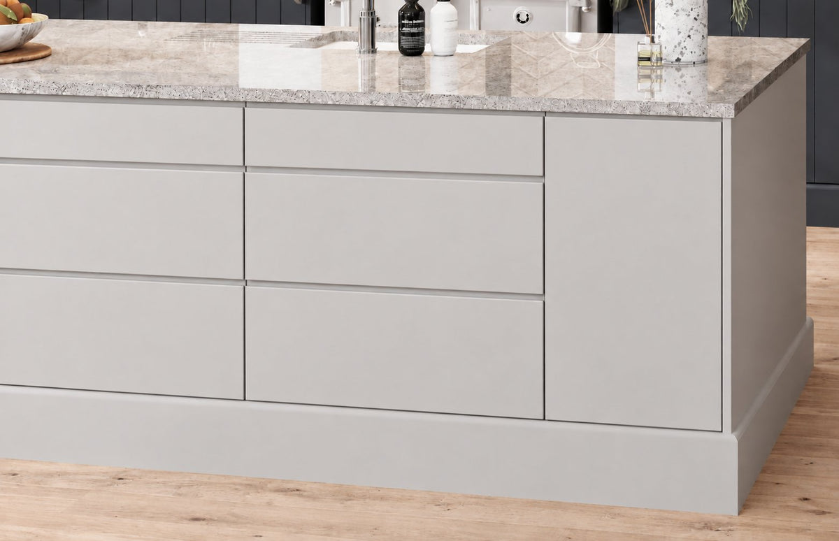 Kitchen island with grey handleless doors and drawer fronts